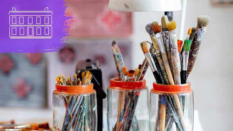 Brushes in a jar on a desk - Groups image