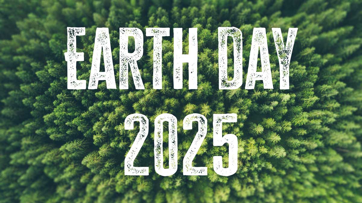 Earth Day 2025 - White text against Green trees